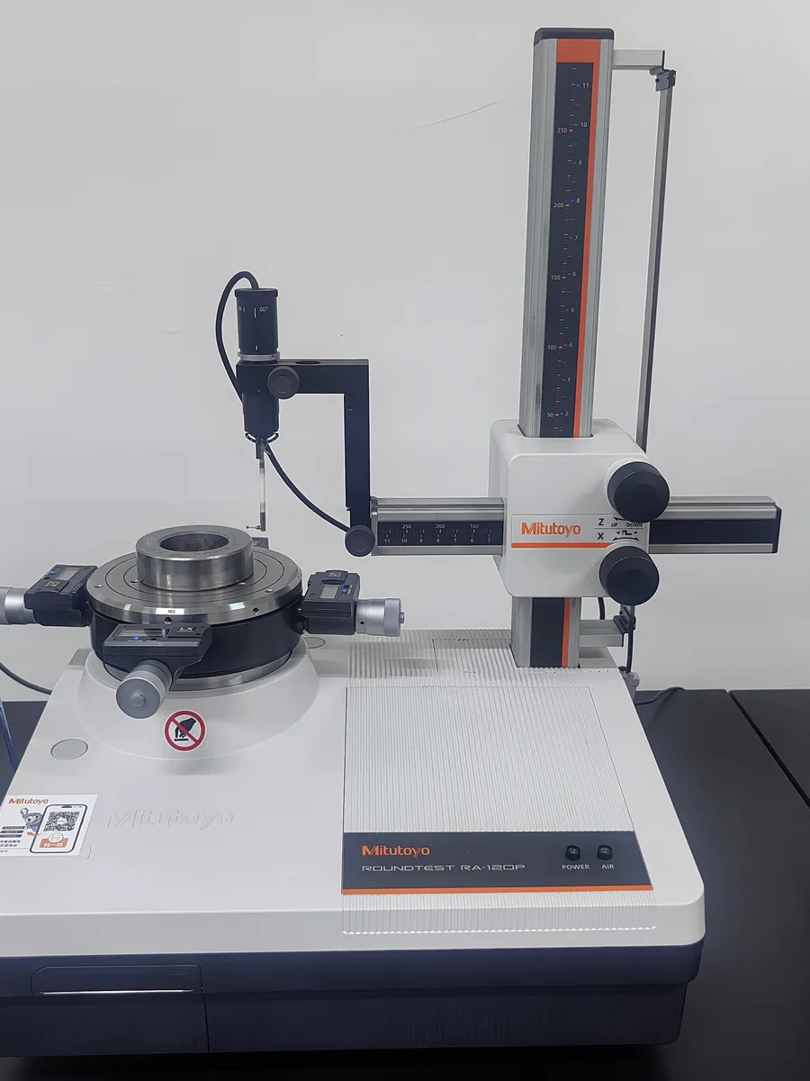 Bearing roundness tester measuring dimensional accuracy in quality laboratory